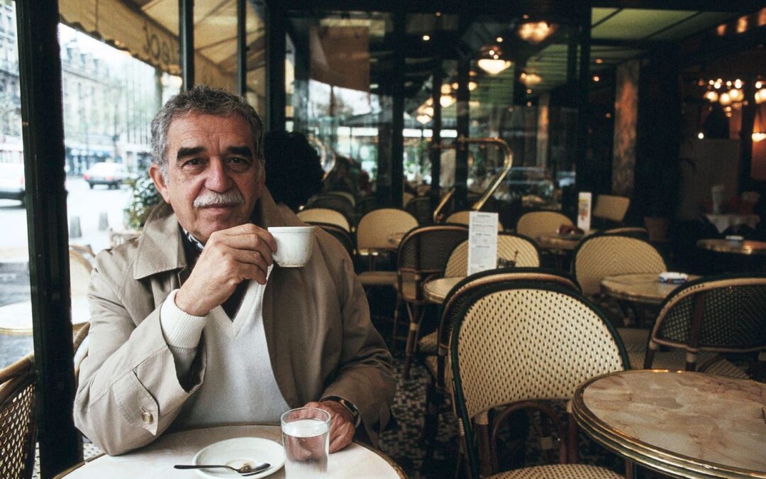 Man in a café drinking coffee