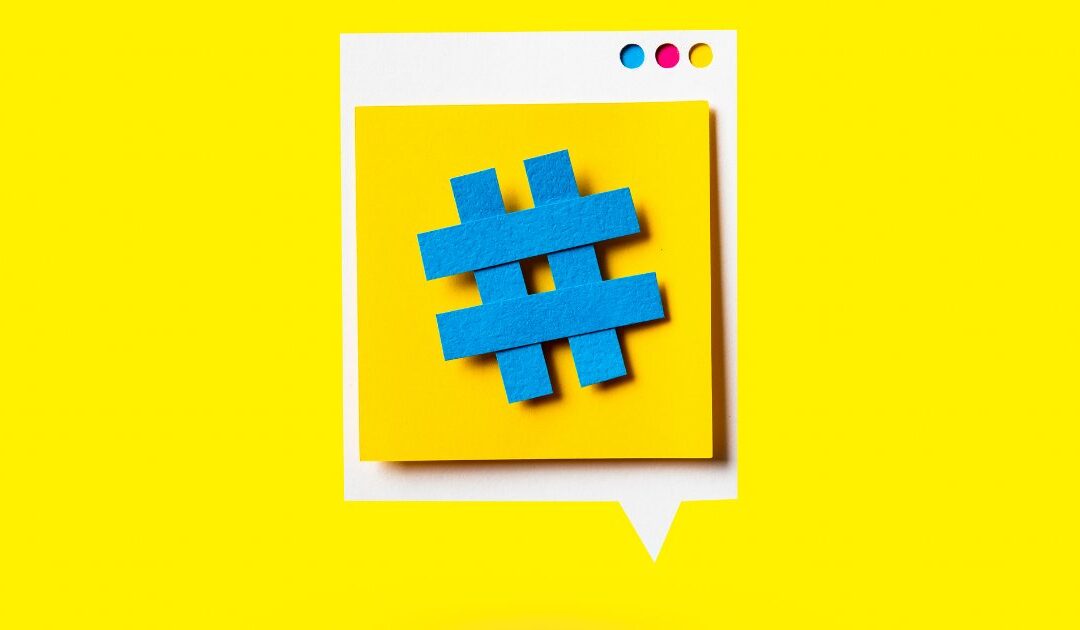 Blue hashtag symbol on yellow background.