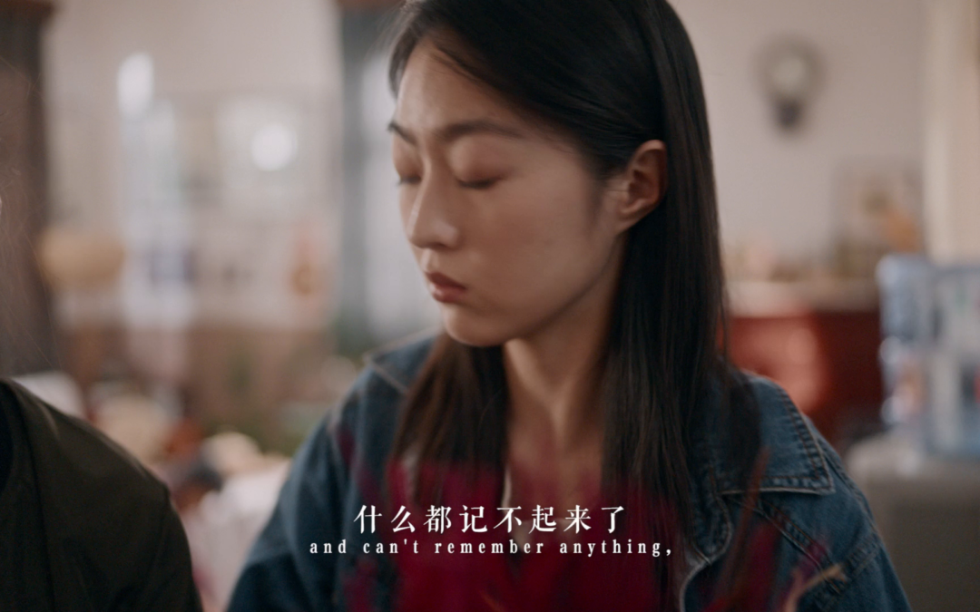 Woman looking down and can't remember anything.