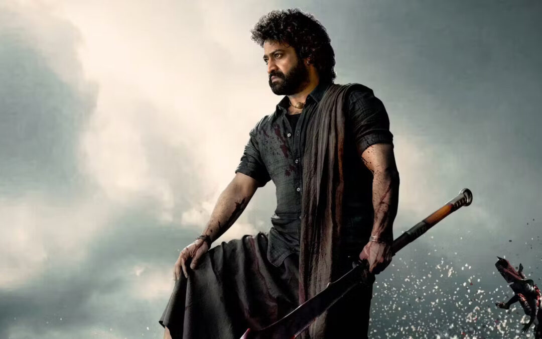 Warrior with bloodied sword in dramatic scenery