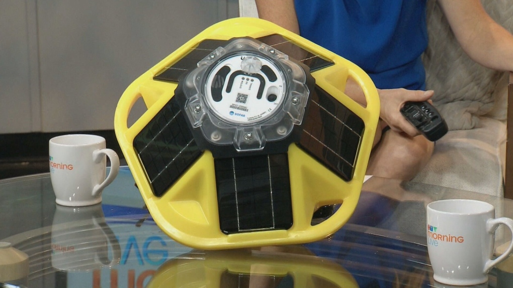 Yellow solar-powered device on table.