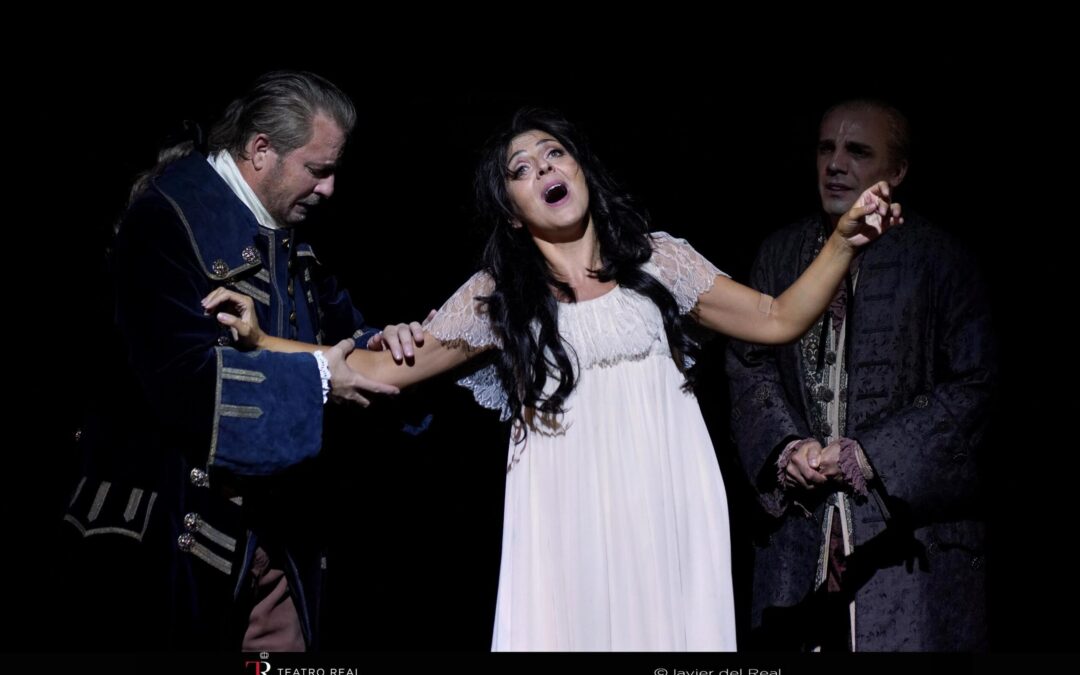 Actors performing dramatic opera scene on stage.