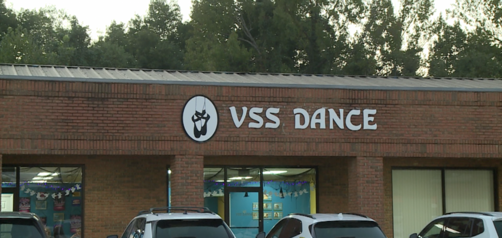 Brick building with VSS Dance sign.