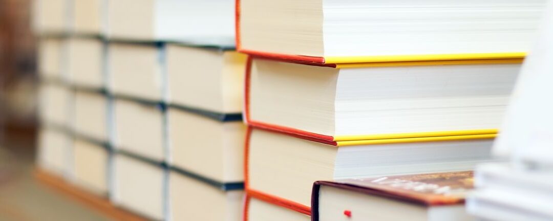 Stack of books with colorful spines