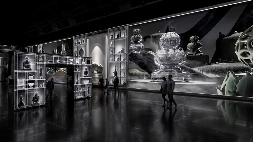 Digital art exhibition with illuminated sculptures and visitors.