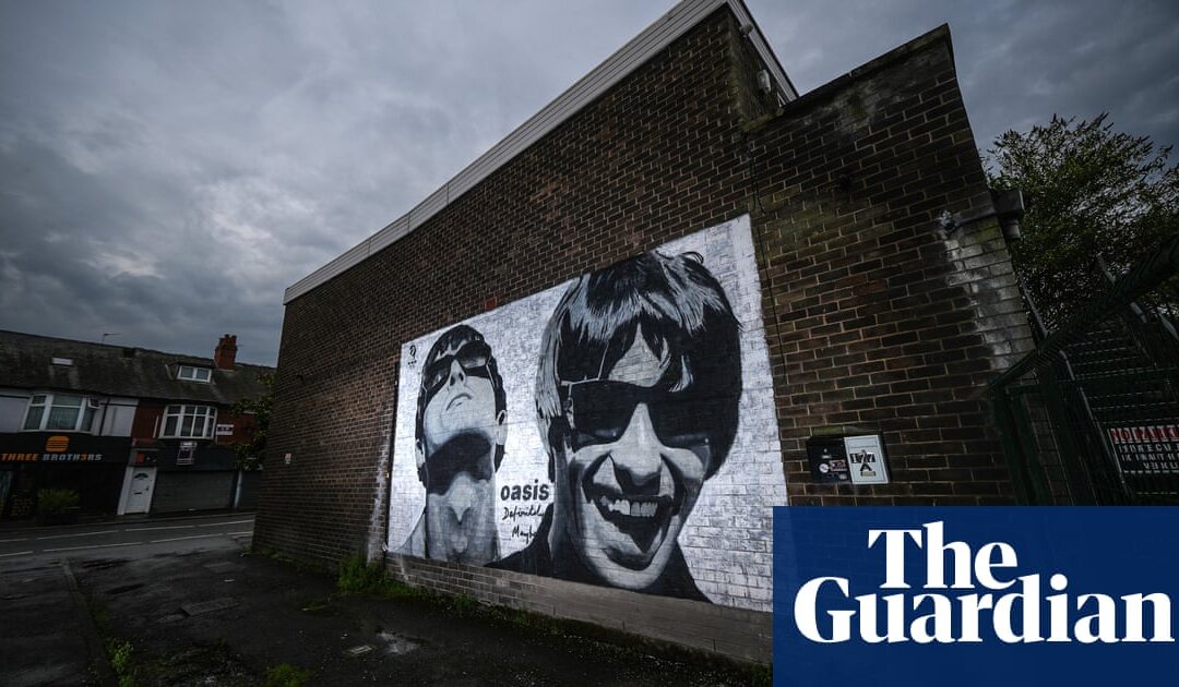 Mural of Oasis band on brick wall