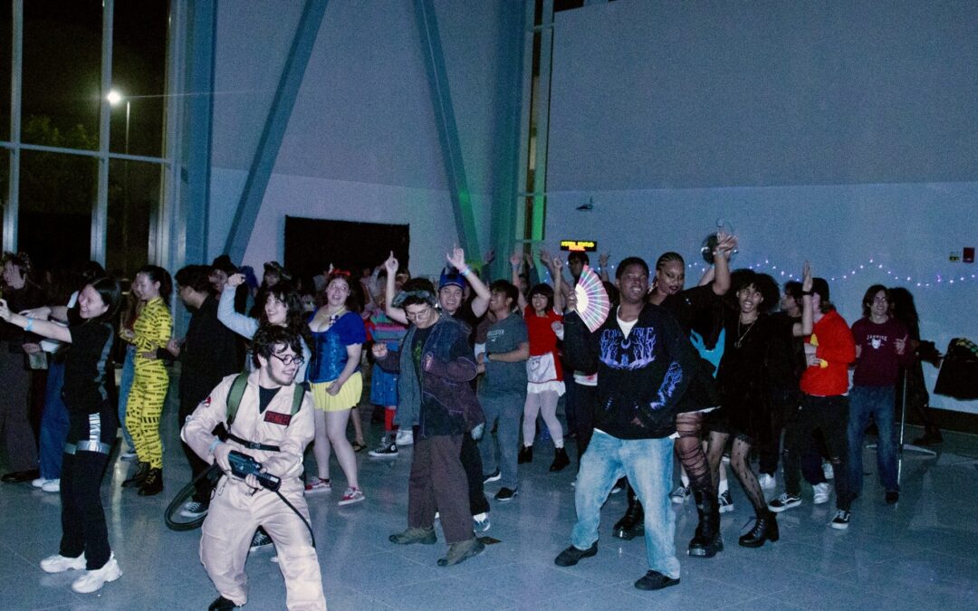 Group dancing at a costume party.