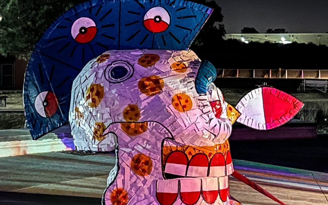 Colorful abstract sculpture at night with lights