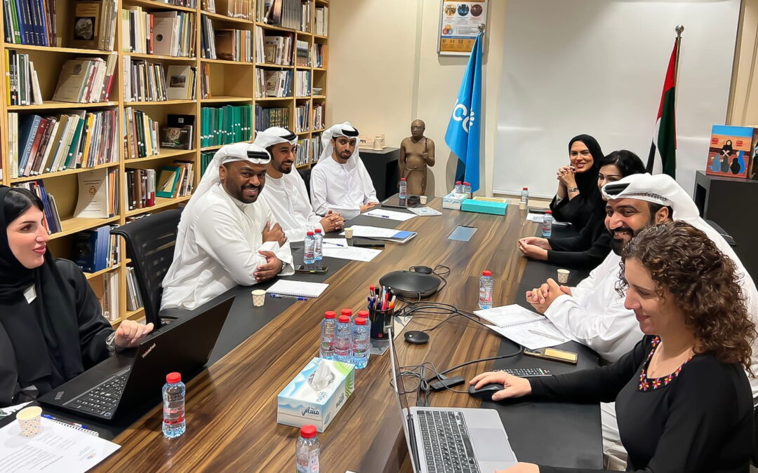 Diverse team having a meeting in a library.