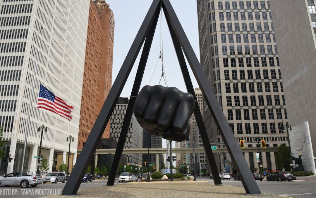 Detroit fist sculpture in downtown cityscape