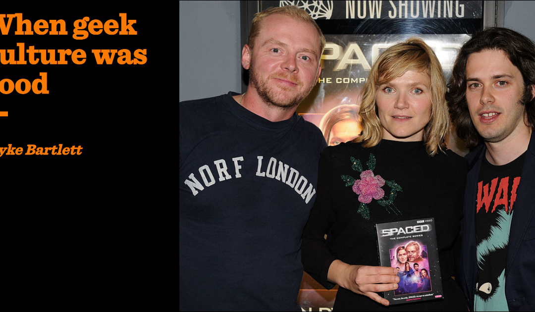 Spaced series cast holding DVD cover.