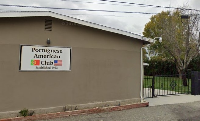 Portuguese American Club building exterior with sign.