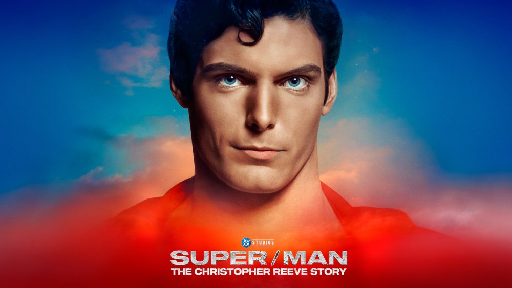 Superman movie poster with dramatic clouds.