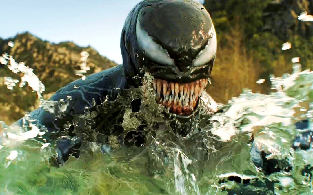 Venom emerging from water, showing sharp teeth.