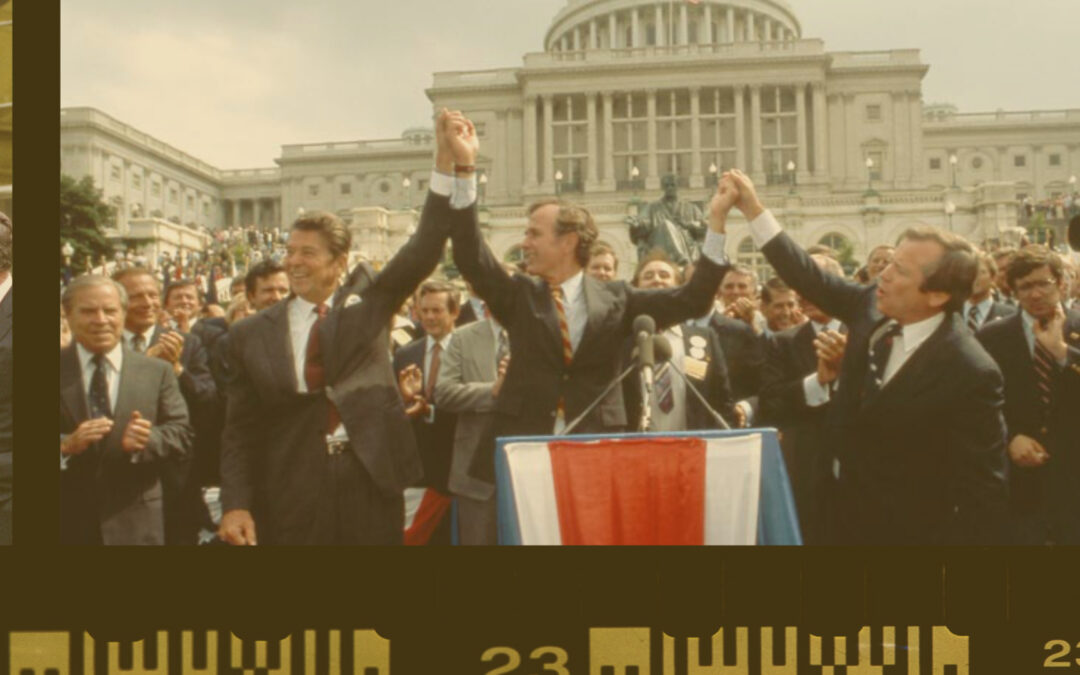 Politicians celebrate outside a government building.