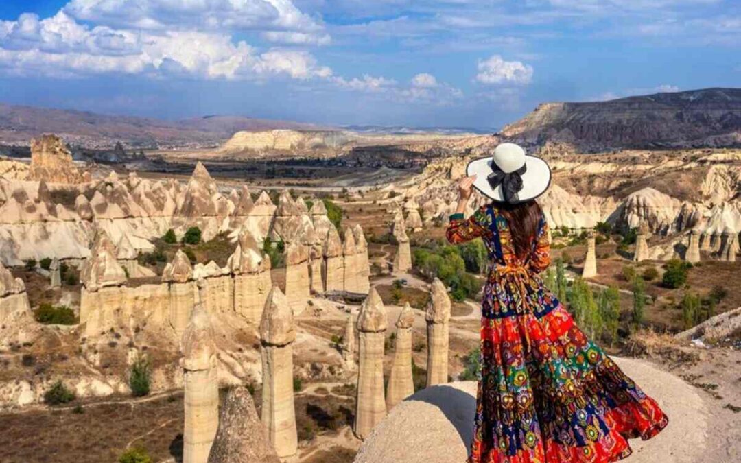 Woman overlooking Cappadocia's rock formations